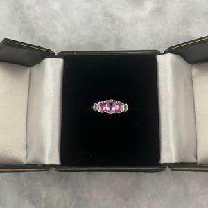 White gold, pink sapphire, and diamond ring